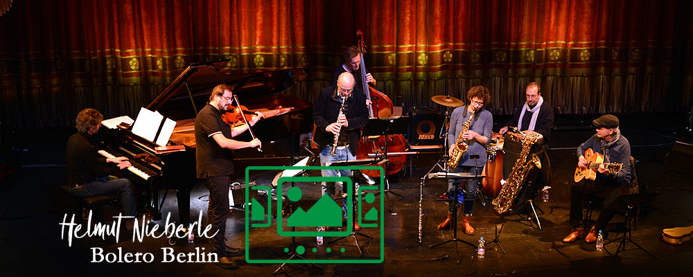 das slideshow-Fenster für 'helmutnieberle.de' anzeigen ...
Martin Stegner (va) - Stephan Holstein (cl) - Raphael Haeger (p) - Esko Laine (b) - Daniel Topo Gioia (perc) - Franzi Forster (fl, sax) - Helmut Nieberle (7-string g)